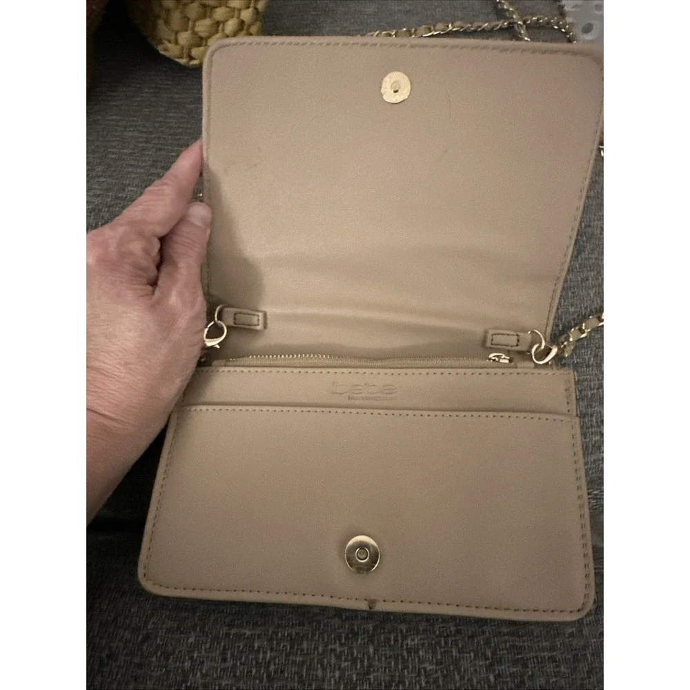 A Vintage bebe purse With Chain Strap